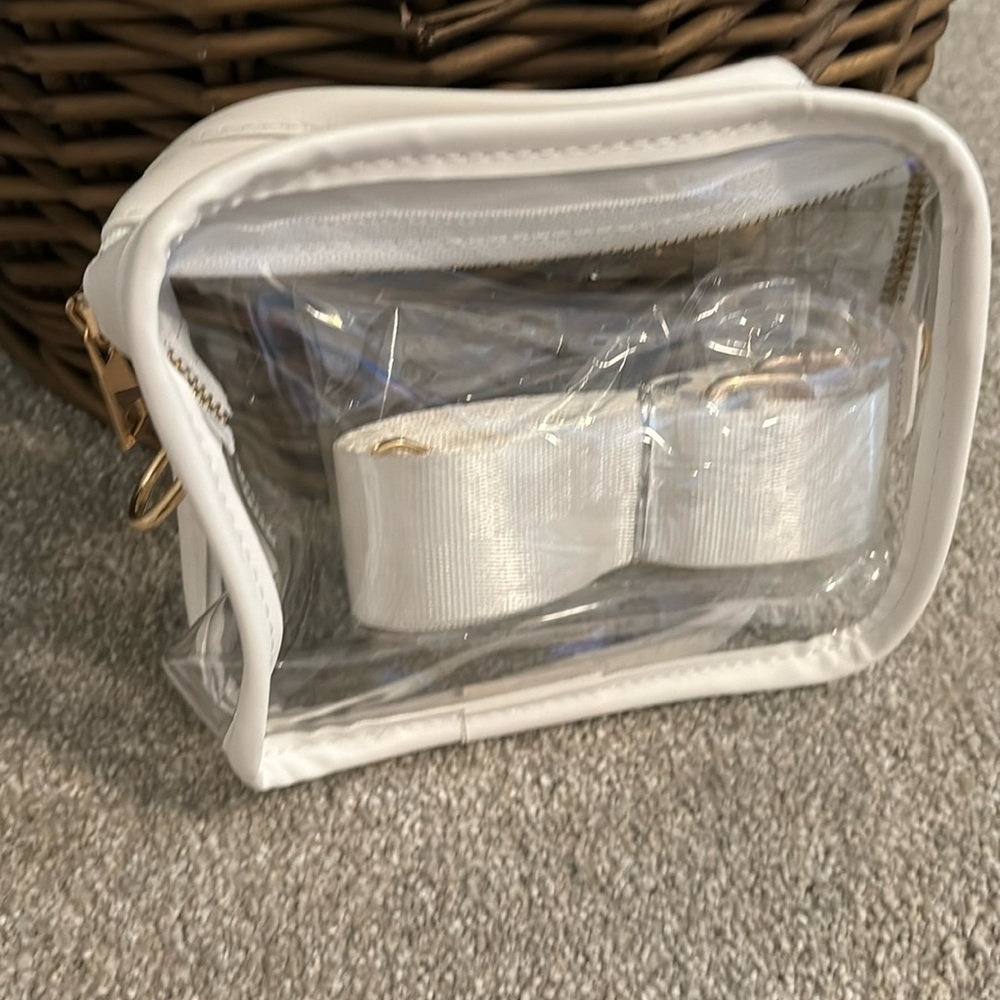 New clear purse w white strap/gold hardware. Just have too many. 6x6